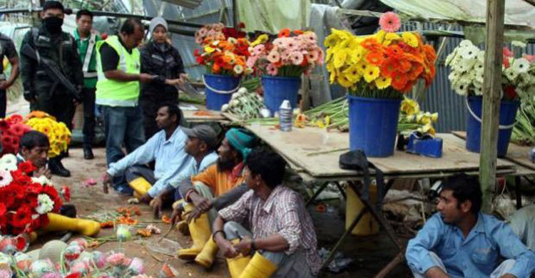 Malaysian cabinet halts intake of new foreign workers