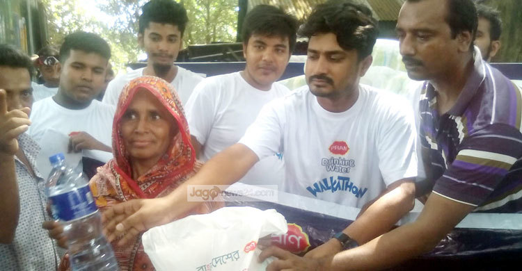 সিরাজগঞ্জে বন্যা দুর্গতদের পাশে প্রাণ