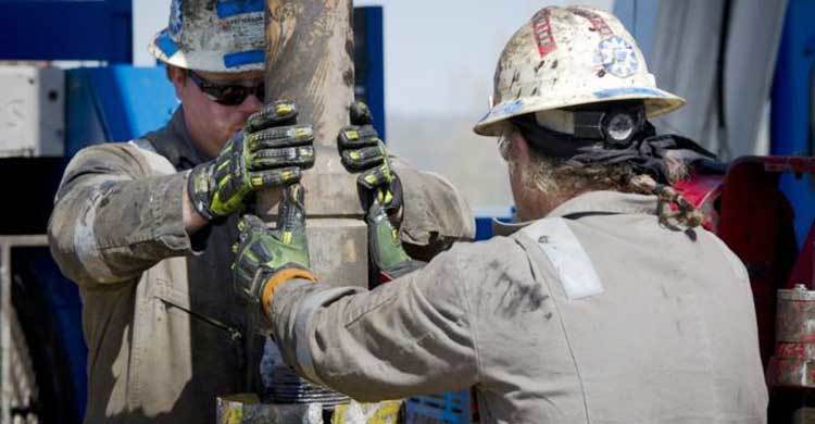 Profit at oil firms hit by fall in crude