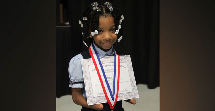 Handless 7-year-old wins handwriting competition