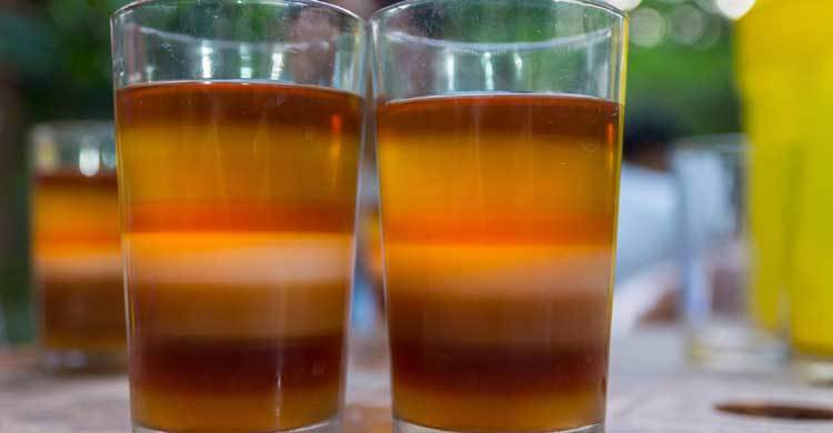 Making rainbows in a glass - seven - layer tea in Bangladesh