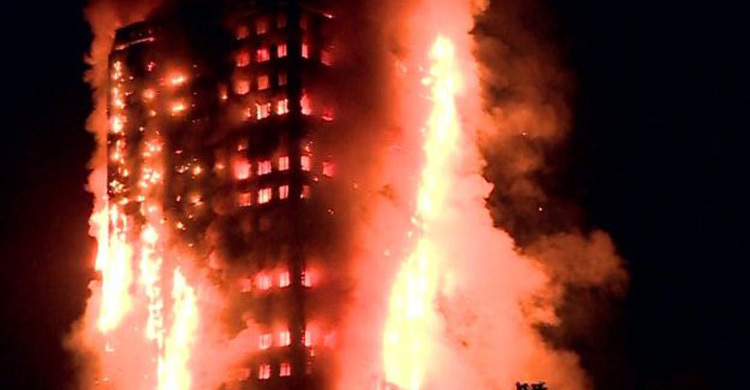 Fire engulfs Grenfell tower block in west London