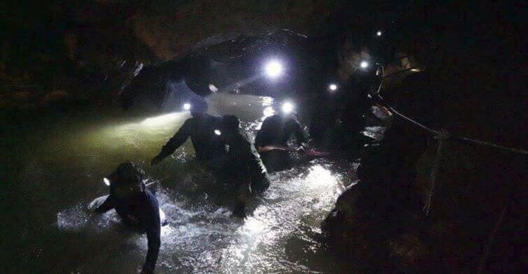 Eight of 13 young footballers rescued from Thai cave