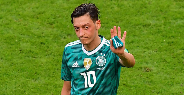 Ozil quits German national team, citing racism