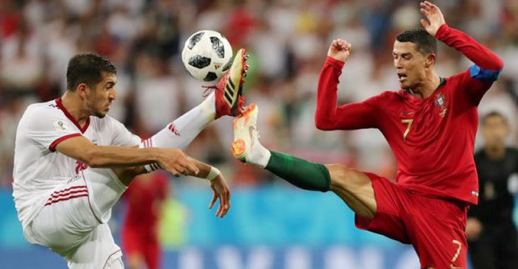 Portugal survive scare against Iran to make knockouts