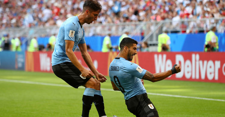 Uruguay beat hosts Russia to finish top of Group A