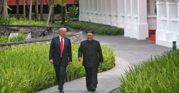In Pictures: Trump and Kim meet for historic summit