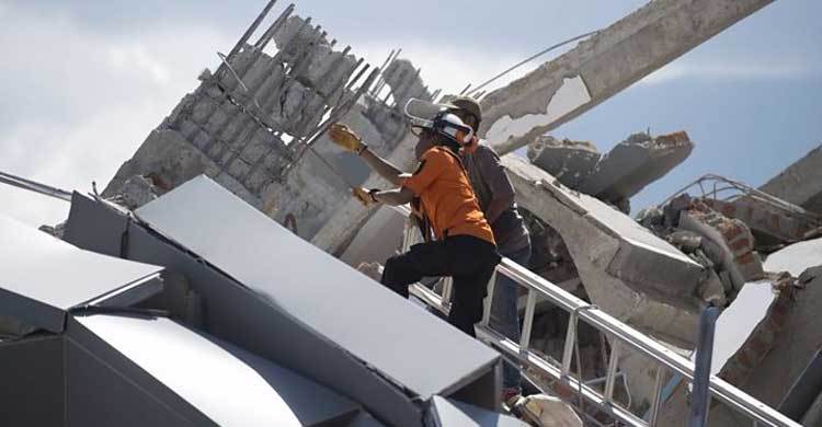 Indonesia earthquake, tsunami: Desperate search for survivors