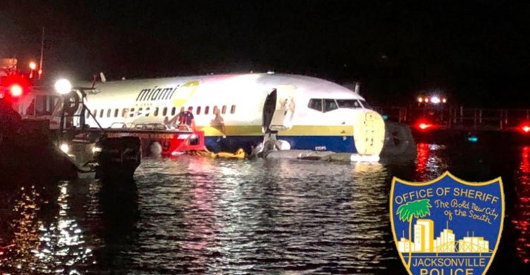 Boeing 737 slides into Florida river with 136 on board