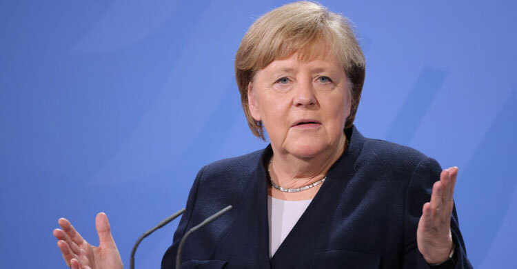 Ukraine war: Angela Merkel defends her record on Putin