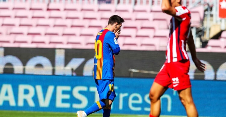 Atletico stay top after draw at Barca