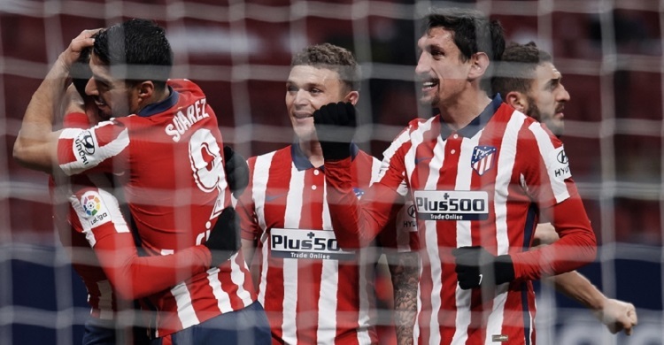 Atletico Madrid win to return to La Liga summit