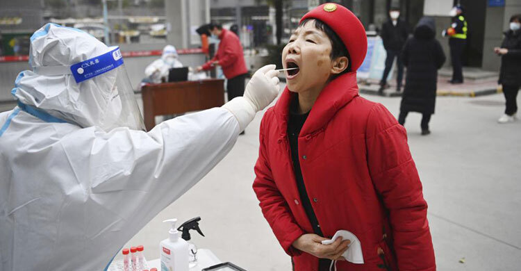 China reports major drop in virus cases in locked-down Xi’an