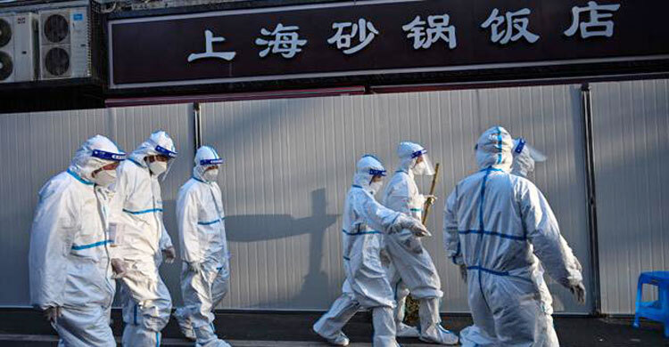 China’s Shanghai launches two-phase lockdown as COVID surges