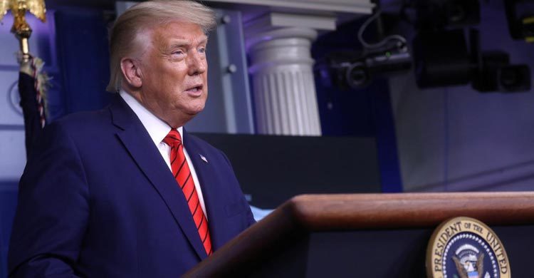 Trump defends supporters accused in deadly clashes