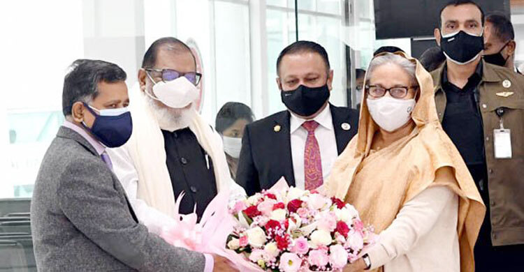 PM returns home from Paris