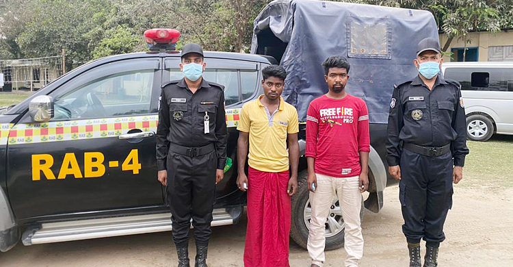 পাথরবোঝাই ট্রাকে ২ কেজি হেরোইন, আটক ২