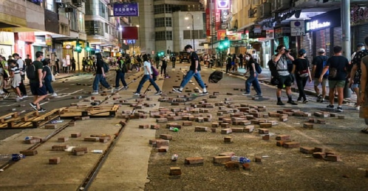 China threatens retaliation against UK for offer to Hongkongers