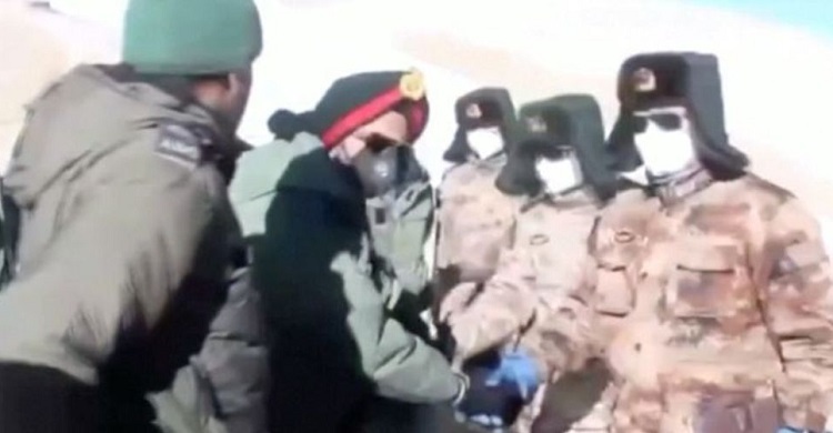 India, China agree to pull back troops from disputed lake