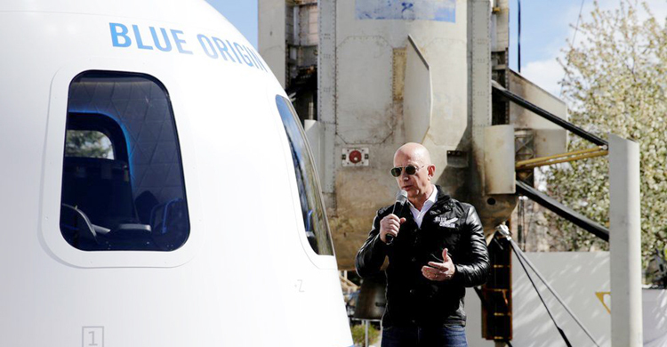 Bidder pays $28m for space trip with Amazon’s Bezos