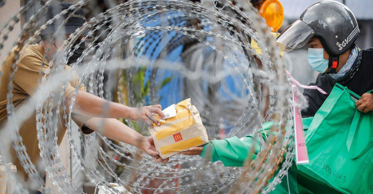 Malaysians in Covid lockdown fly white flags to ask for help