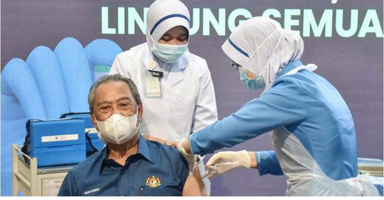 Malaysia launches COVID-19 vaccination drive as PM gets first shot