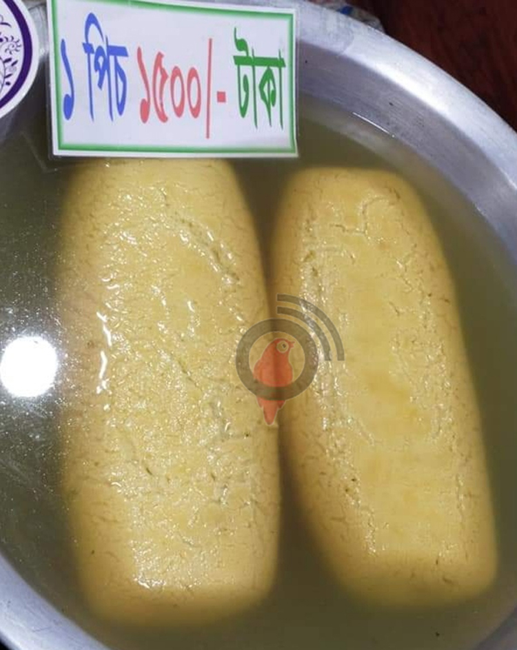 মেলায় ৮ কেজির এক বালিশ মিষ্টির দাম ৩ হাজার