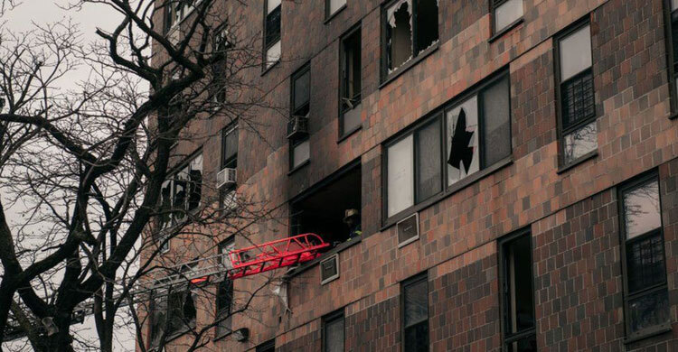 New York fire: 19 killed in apartment block blaze