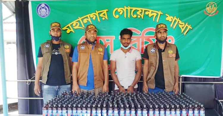 ট্রাকে পাথরের নিচে লুকানো ছিল ৩০০ বোতল ভারতীয় ফেনসিডিল