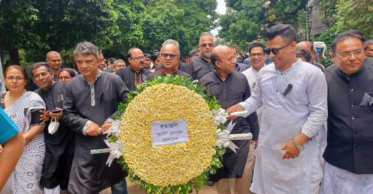 শোক দিবসে বঙ্গবন্ধুর প্রতিকৃতিতে অ্যাটর্নি জেনারেলের শ্রদ্ধা
