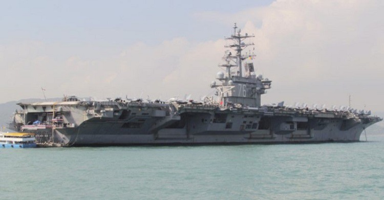 US Navy says carrier group operating in South China Sea