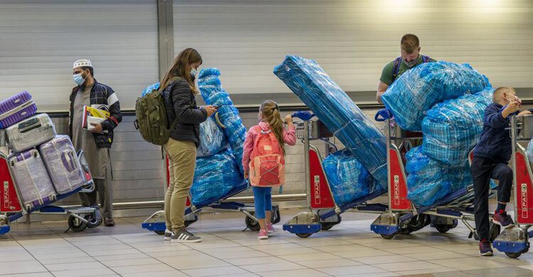 COVID variant spreads to more countries as world on alert