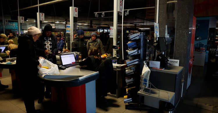 Ukraine curbs power usage after Russia attacks energy plants