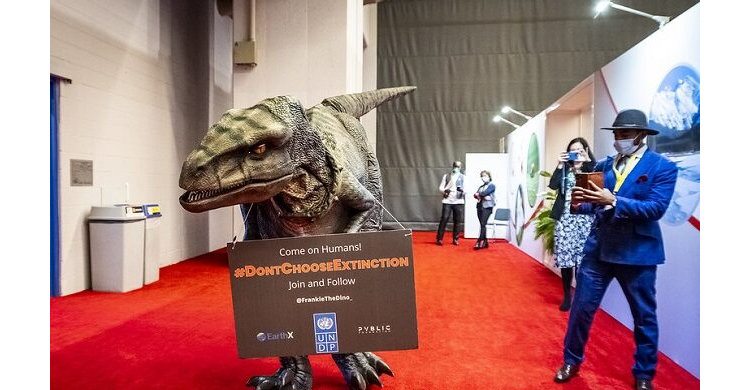 Dinosaur at COP15 urges don’t choose extinction