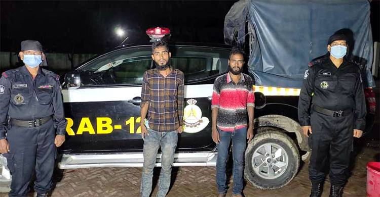ট্রাকে ৭৭ কেজি গাঁজা পরিবহনকালে ধরা দুই মাদক ব্যবসায়ী