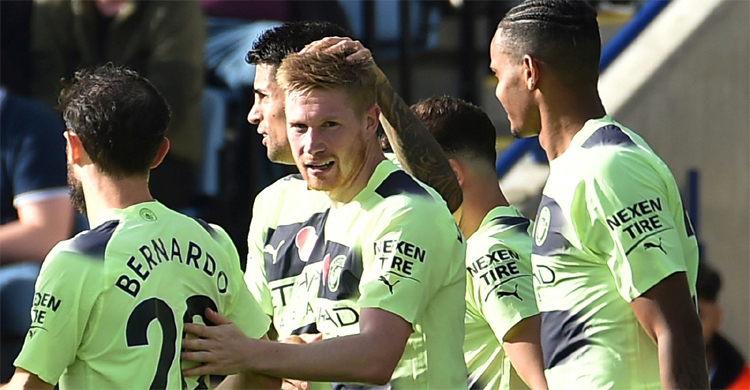 De Bruyne's stunning free-kick sends City top of table