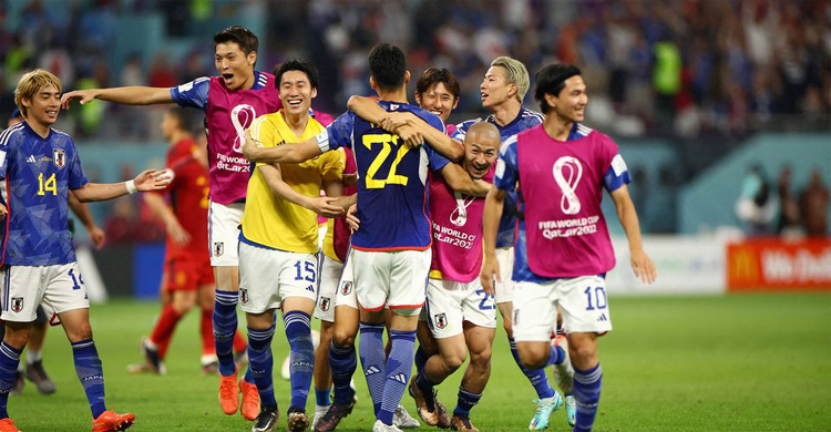 Japan roar back again to shock Spain and top group