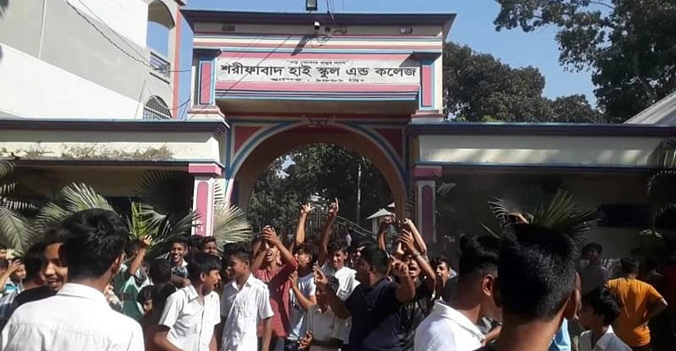 Teacher held on student molestation charge