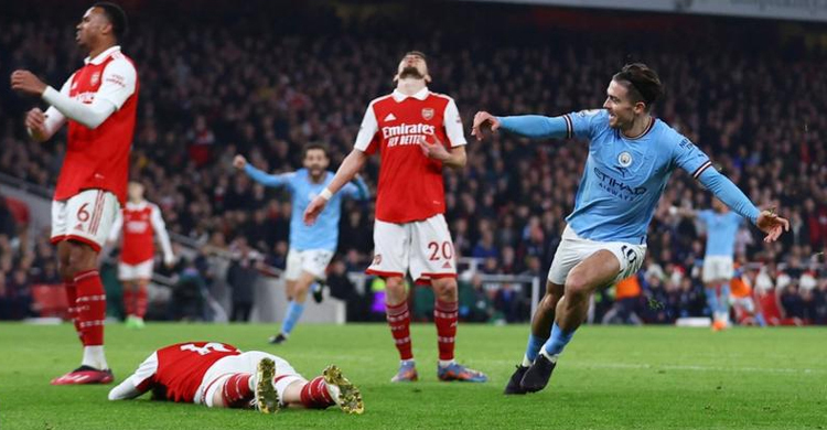 Man City go top with win over title rivals Arsenal