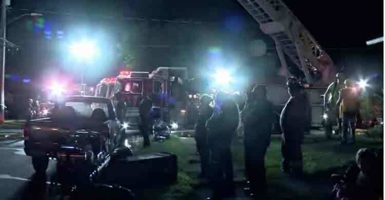 US fireman finds 10 dead in house blaze are his family