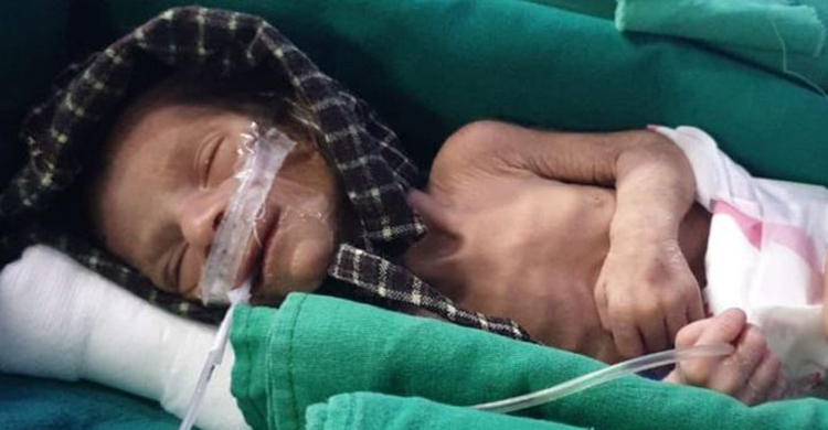 কবর থেকে জীবিত শিশু উদ্ধার!