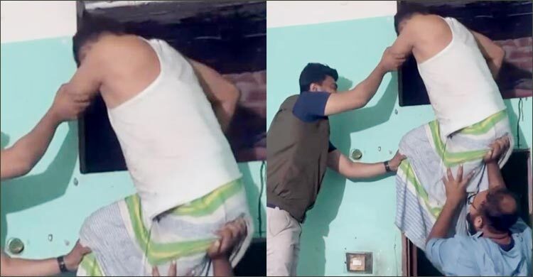 স্টোর রুম থেকে আসামিকে কোলে করে নামালো পুলিশ