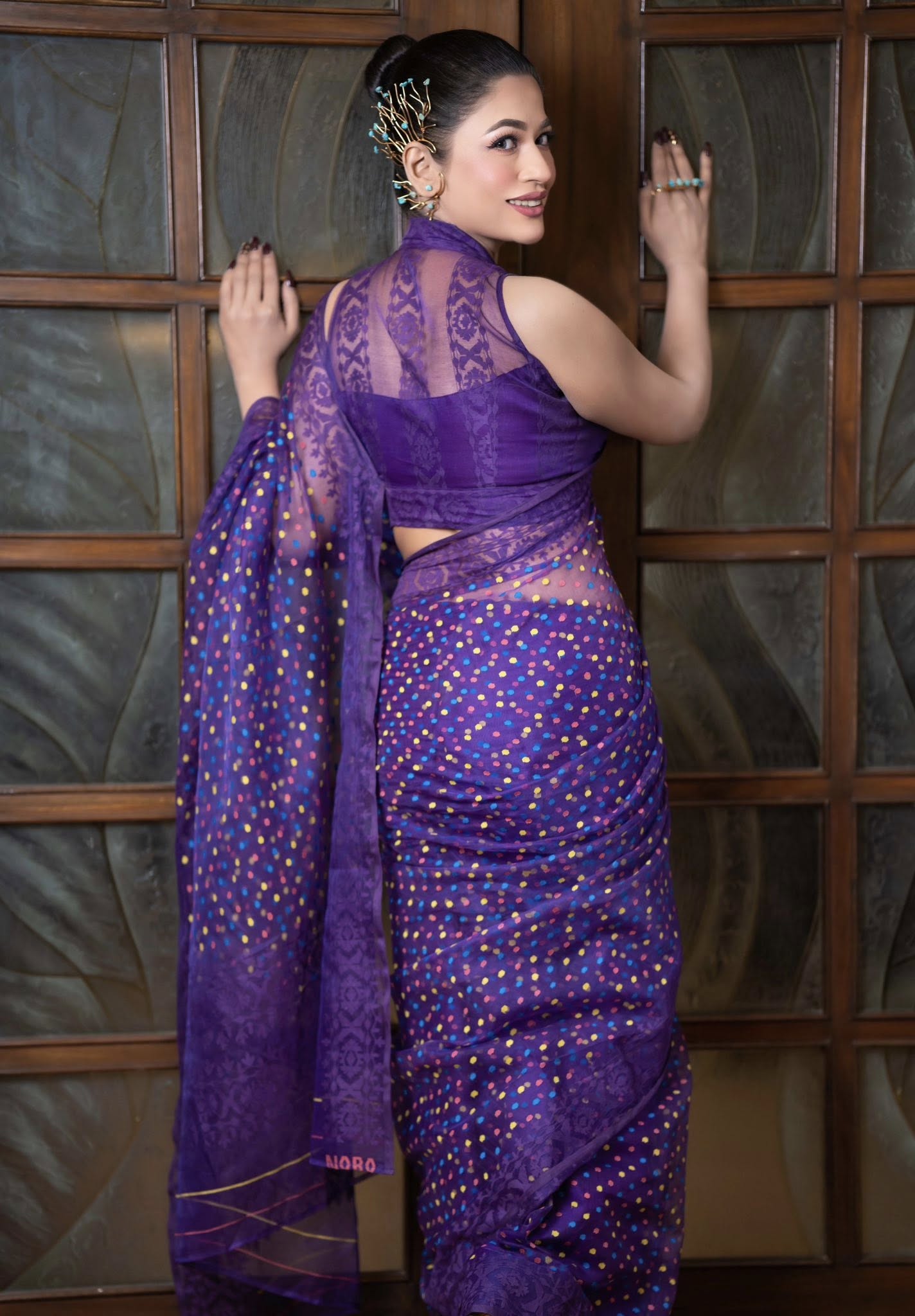 পার্পেল শাড়িতে লাস্যময়ী বাঁধন