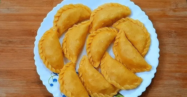 তাল দিয়ে বানিয়ে নিন ভাপা পুলি