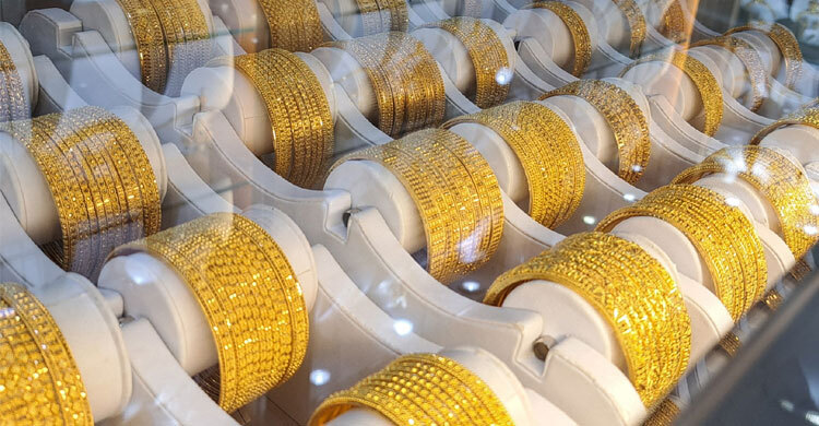 বিশ্ববাজারে সোনার দাম রেকর্ড উচ্চতায়, কমেছে ডলারের মূল্য