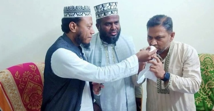 পরাজিত বিএনপি প্রার্থীকে মিষ্টিমুখ করালেন আমির হামজা