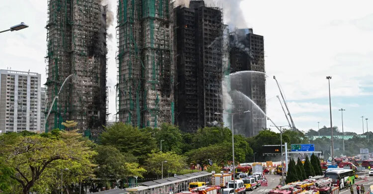 Death toll hits 55 as Hong Kong towers burn for 2nd day