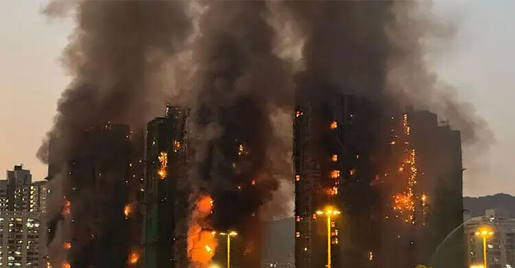 Four dead, dozens feared trapped as fire sweeps Hong Kong high-rises