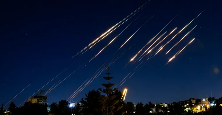 Iranian missile barrage hits Israel, killing several people