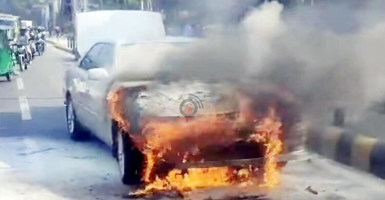 Private car catches fire at Kurmitola